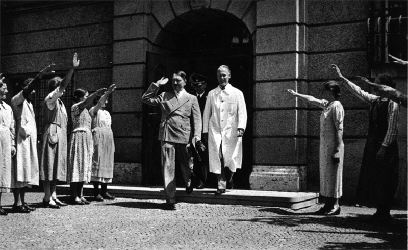 Adolf Hitler leaves the Orthopedic Clinic of Munich after his visit